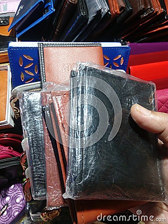 Various Male wallets selling by street vendor Stock Photo