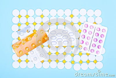 Various medications: pills, blister pills, drugs, macros, copy space blue background Stock Photo
