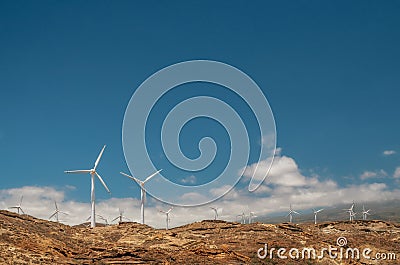 Various mountain wind turbine with blue sky Stock Photo