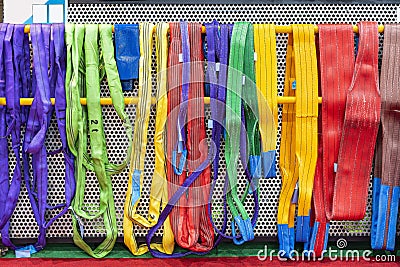 Various multi color such as red green yellow blue purple violet gray brown of flat webbing sling or polyester belt for lift and Stock Photo