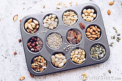 Various nuts and seeds on white background Stock Photo