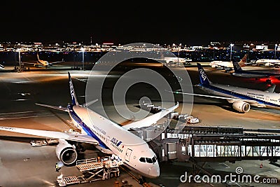 Various Passenger Jets During Flight Preparation at Haneda Airport Editorial Stock Photo