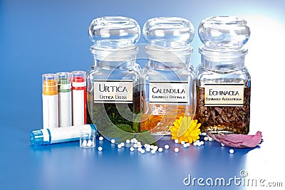 Various plant extract in bottles and homeopathic medication Stock Photo