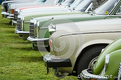 Various retro cars standing in a row in the exhibition field. Editorial Stock Photo