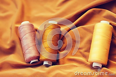 Various Sewing Accessories: colored threads, scissors Stock Photo