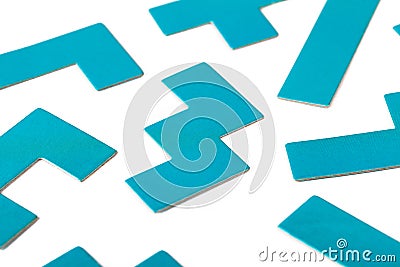 Various shapes, blue puzzle elements, pattern, white background abstract. Scattered unorganized parts, simple unlinked parts Stock Photo