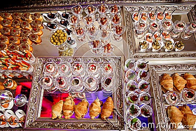 Various snacks at the event on a mirrored tray Stock Photo