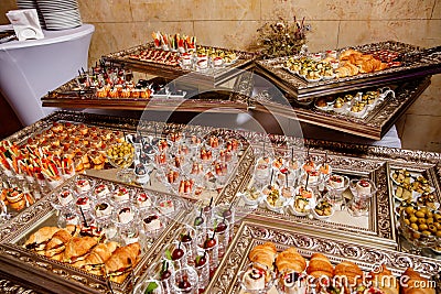 Various snacks at the event on a mirrored tray Stock Photo