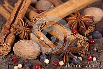 Various spices (nutmeg, cinnamon, star anise,cardamom, juniper) Stock Photo