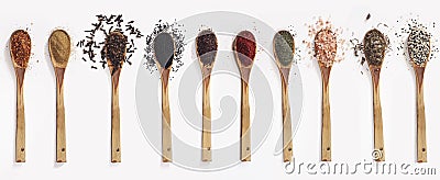 Various spices spoons on white table. Top view with copy space. Stock Photo