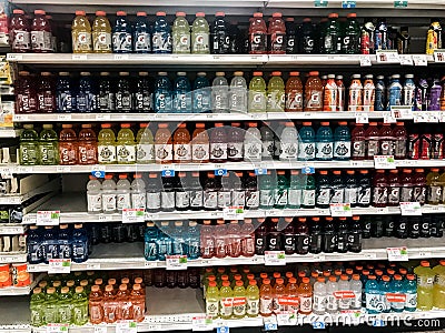 Various Sports Energy Drinks for Sale in a Grocery Store Editorial Stock Photo