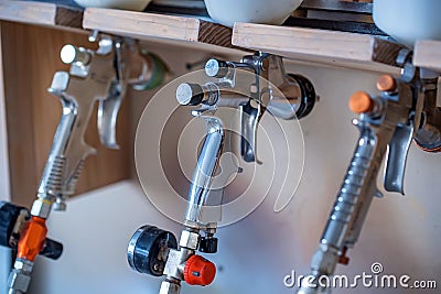 Various spray guns or airbrushes Stock Photo