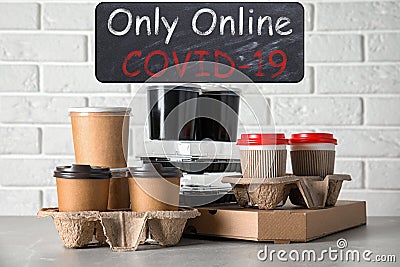 Various takeout containers. Online food delivery service Stock Photo