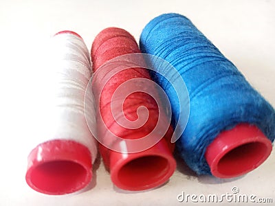 various threads for sewing materials for the month of July Stock Photo