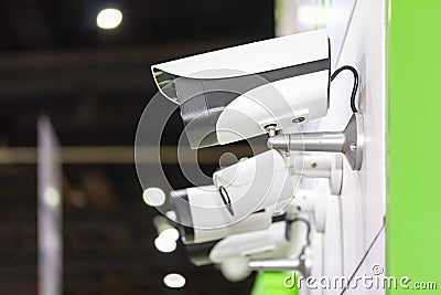 Various type close circuit camera or cctv attached on the wall for protect assets Stock Photo