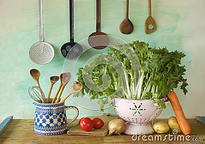 Various vegetables plus kitchen equipment Stock Photo