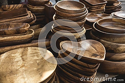 Various wooden plates and trays for sale at a handicraft store at Dapitan Arcade, Quezon City, Philippines Stock Photo