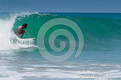 VARKALA, INDIA - Mar 14, 2020: People Surfing in the Coasts of Varkala near Trivandrum Editorial Stock Photo