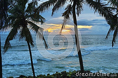 Varkala tropical beach at sunset, Kerala, India Stock Photo