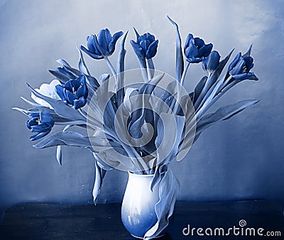 Interior still life, vase with tulips in blue Stock Photo