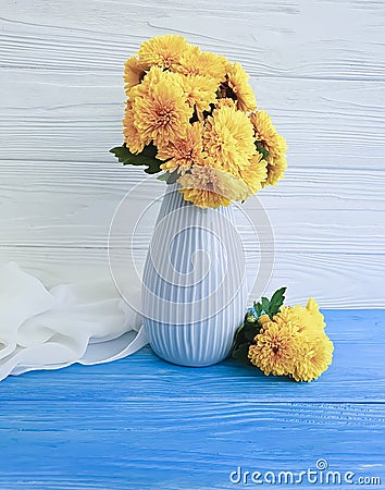 Vase bouquet vintage yellow chrysanthemum home elegance celebration on a wooden background, autumn blossom Stock Photo