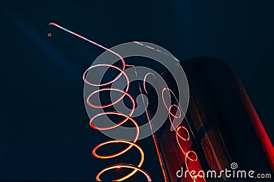 Vat and metallic spiral of alcohol machine red illuminated Stock Photo