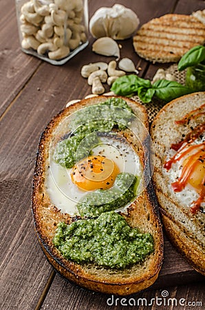 Vatiations of fried eggs inside bread Stock Photo