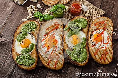 Vatiations of fried eggs inside bread Stock Photo