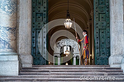 VATICAN CITY, ITALY - JUNE 8, 2018 : A member of the Pontifical Swiss Guard, Vatican. Rome Editorial Stock Photo