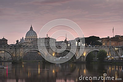 Vatican City, Rome, Italy, Beautiful Vibrant Night image Panorama of St. Peter`s Basilica, Ponte St. Angelo and Tiber River at Dus Stock Photo