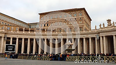 Vatican, Jan. 2, 2023: Queue of people waiting to enter at St. Peter's Basilica to see the body of Pope Benedict XVI Editorial Stock Photo