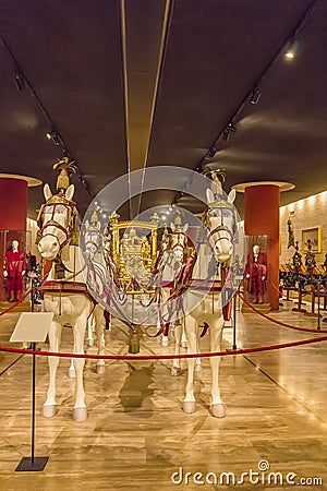 Carriage in the Hall of the historic transportation vehicles of the Pope, Vatican Museum. I Editorial Stock Photo