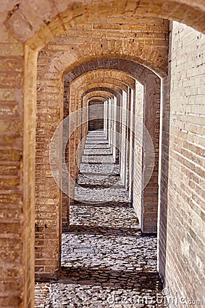 Vaulted arcades of Khaju bridge, Isfahan, Iran Stock Photo