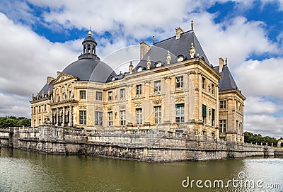 Vaux-le-Vicomte, France. View of the central building of the estate, surrounded by an artificial channel Editorial Stock Photo