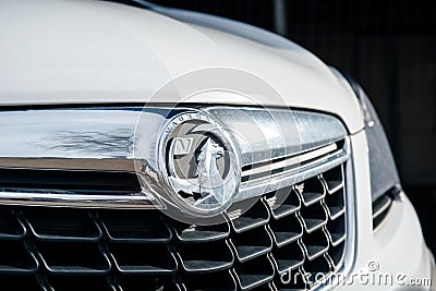 Vauxhall logotype insignia on a white car in Bristol Editorial Stock Photo
