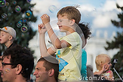 VDNH. Exhibition of achievements of national resources. Moscow. Summer. Man with his son. Editorial Stock Photo