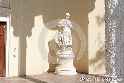 VDNKh. Pavilion 44 Rabbit breeding. Sculpture of a girl holding and feeding a rabbit. Editorial Stock Photo