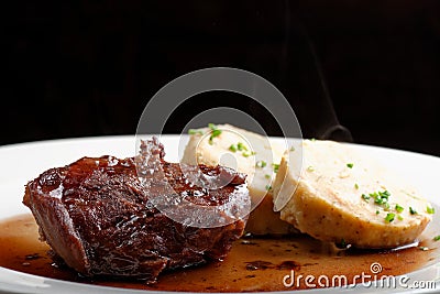 Veal fillet with rich sauce and bread dumplings Stock Photo