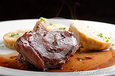 Veal fillet with rich sauce and bread dumplings Stock Photo