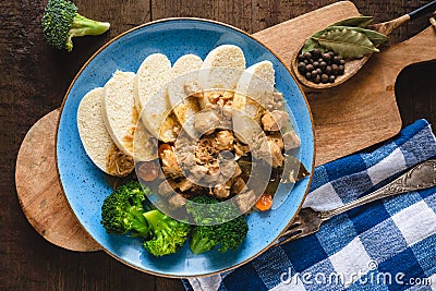 Veal stew with steamed yeast dumplings Stock Photo