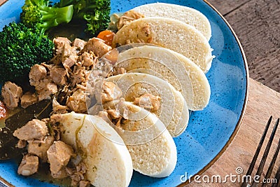 Veal stew with steamed yeast dumplings Stock Photo