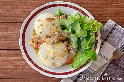 Veal stew with steamed yeast dumplings Stock Photo