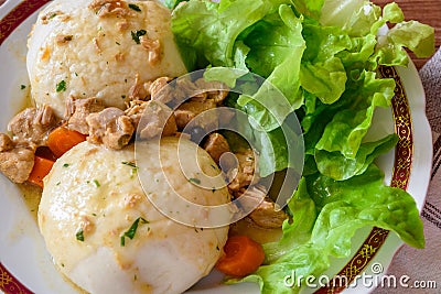 Veal stew with steamed yeast dumplings Stock Photo