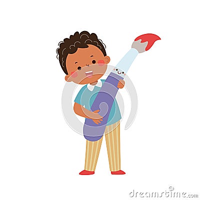 Vector cartoon little student boy holding big paintbrush. Back to school concept Vector Illustration