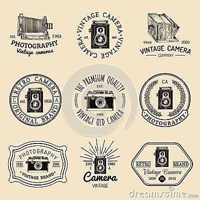 Vector set of old cameras logos. Vintage photo studio, salon signs, labels or badges. Vector Illustration