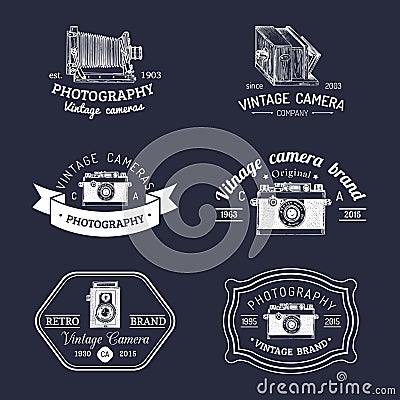 Vector set of old cameras logos. Vintage photo studio, salon signs, labels or badges. Vector Illustration