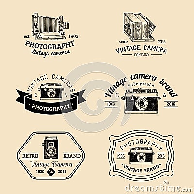 Vector set of old cameras logos. Vintage photo studio, salon signs, labels or badges. Vector Illustration