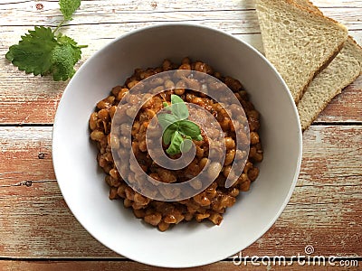 Vegan bean goulash with paprika and marjoram. Stock Photo