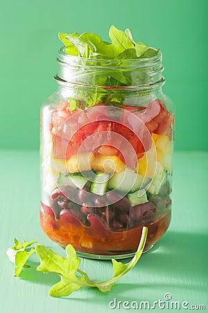 Vegan bean vegetable salad in mason jar Stock Photo