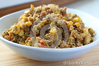 Vegan cauliflower rice with vegetables. Stock Photo